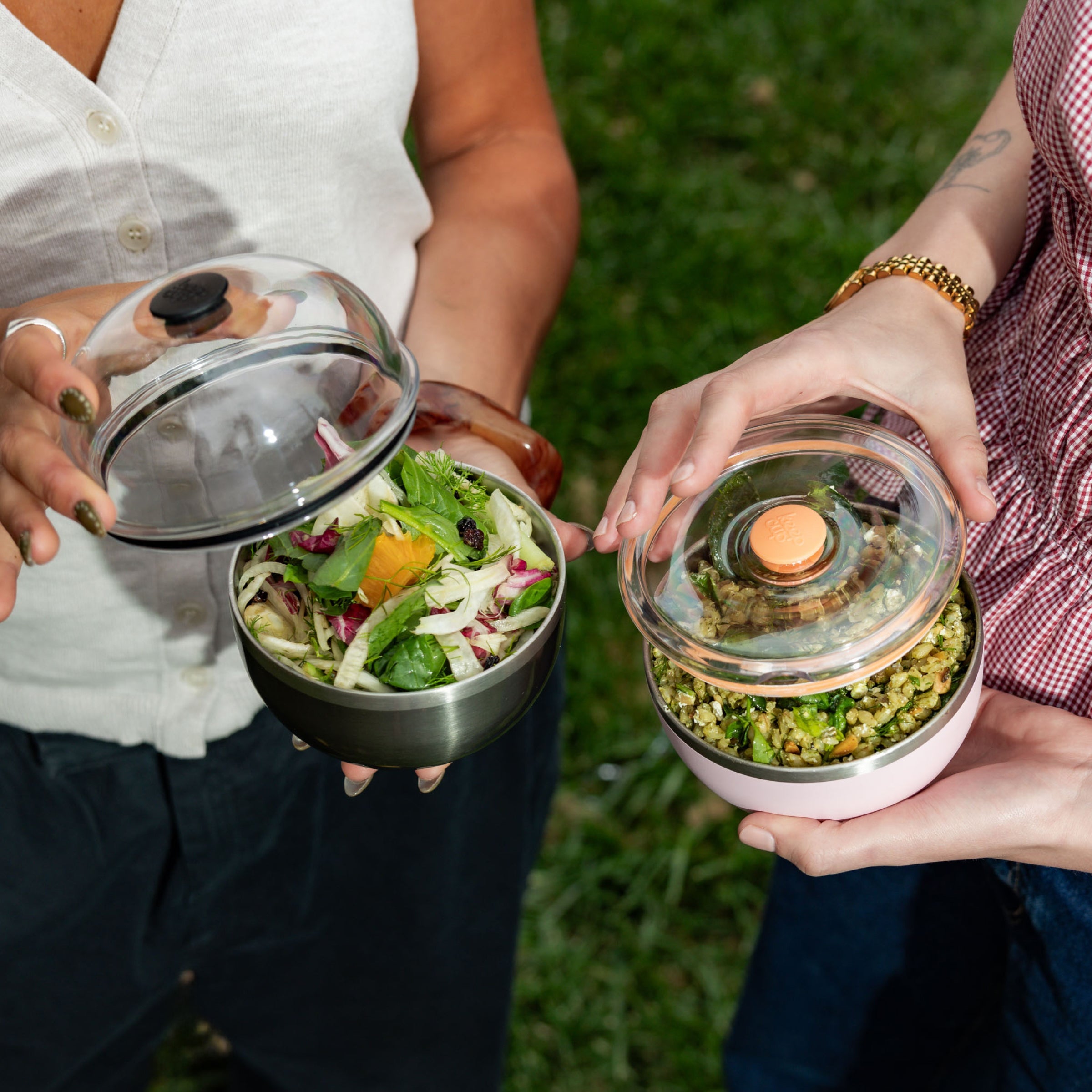 Pink KeepCup Go Bowl filled with popcorn, showcasing the 550ml reusable food container's sleek design and secure vacuum-sealed lid for on-the-go snacks and meals