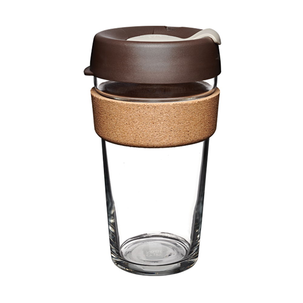 KeepCup Brew Cork L 16oz in Almond, featuring a clear tempered glass cup with natural cork band and brown silicone lid with cream-coloured plug, shown against a white background.
