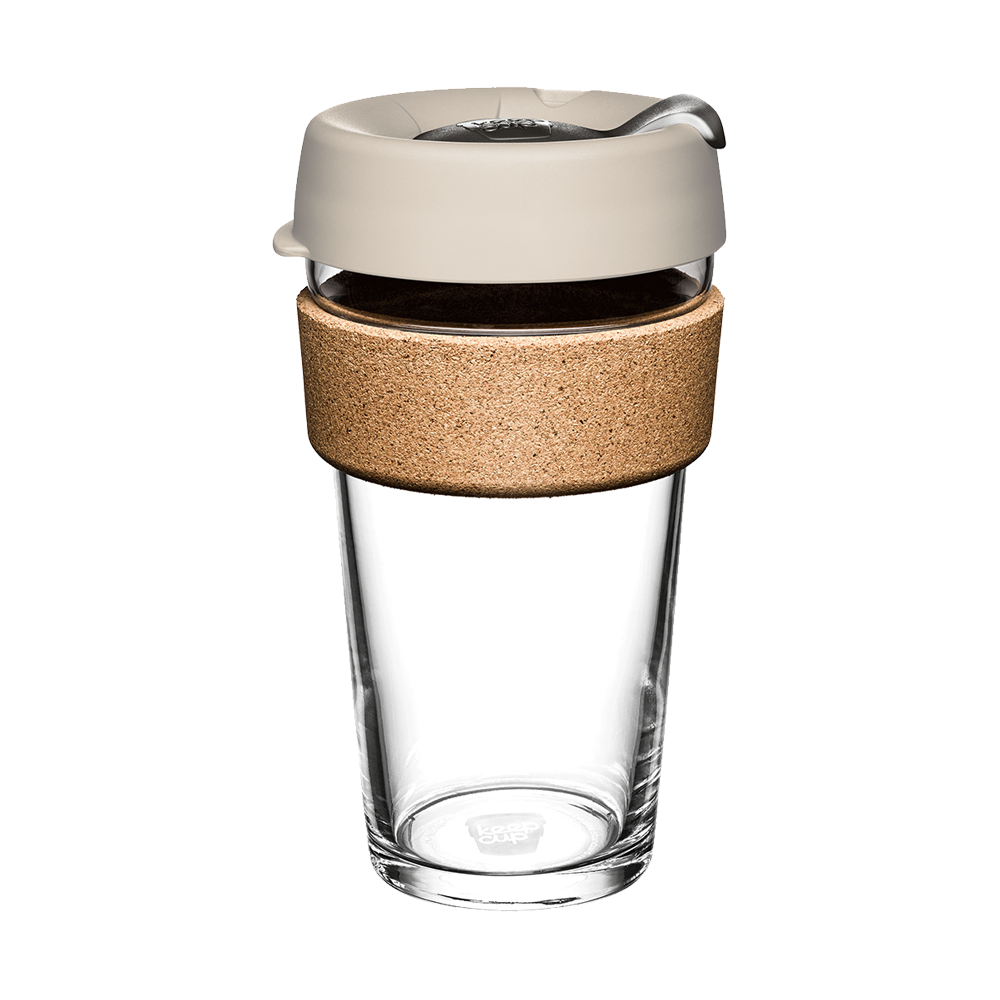 KeepCup Brew Cork L 16oz in Filter colour, featuring a clear tempered glass cup with natural cork band and light grey silicone lid with splash-proof plug, shown against a white background.