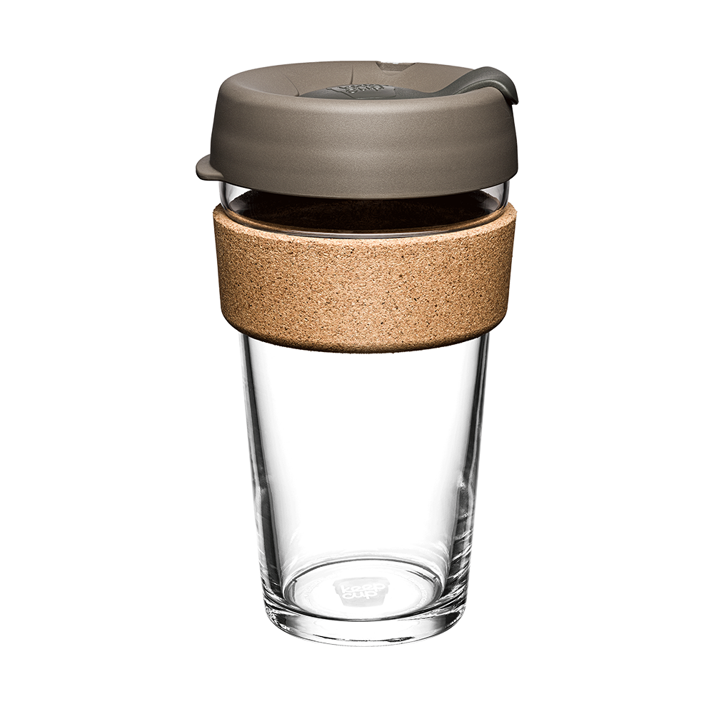 KeepCup Brew Cork L 16oz in Latte colour, featuring a clear glass body, natural cork band, and taupe-coloured lid with sipper, shown against a white background.