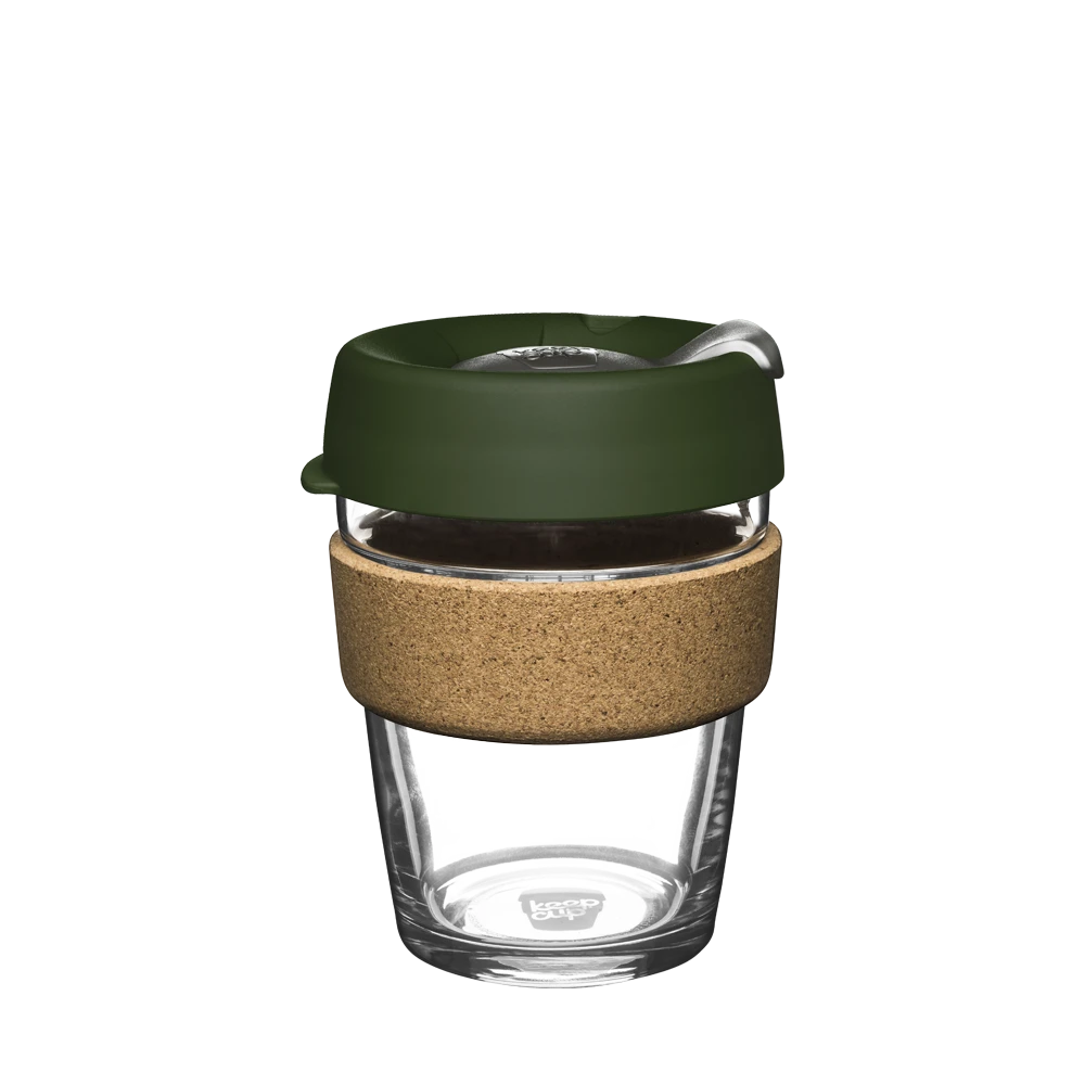KeepCup Brew Cork M 12oz in Pine, featuring a clear glass cup with natural cork band and olive green lid with sipper spout, shown against a white background.