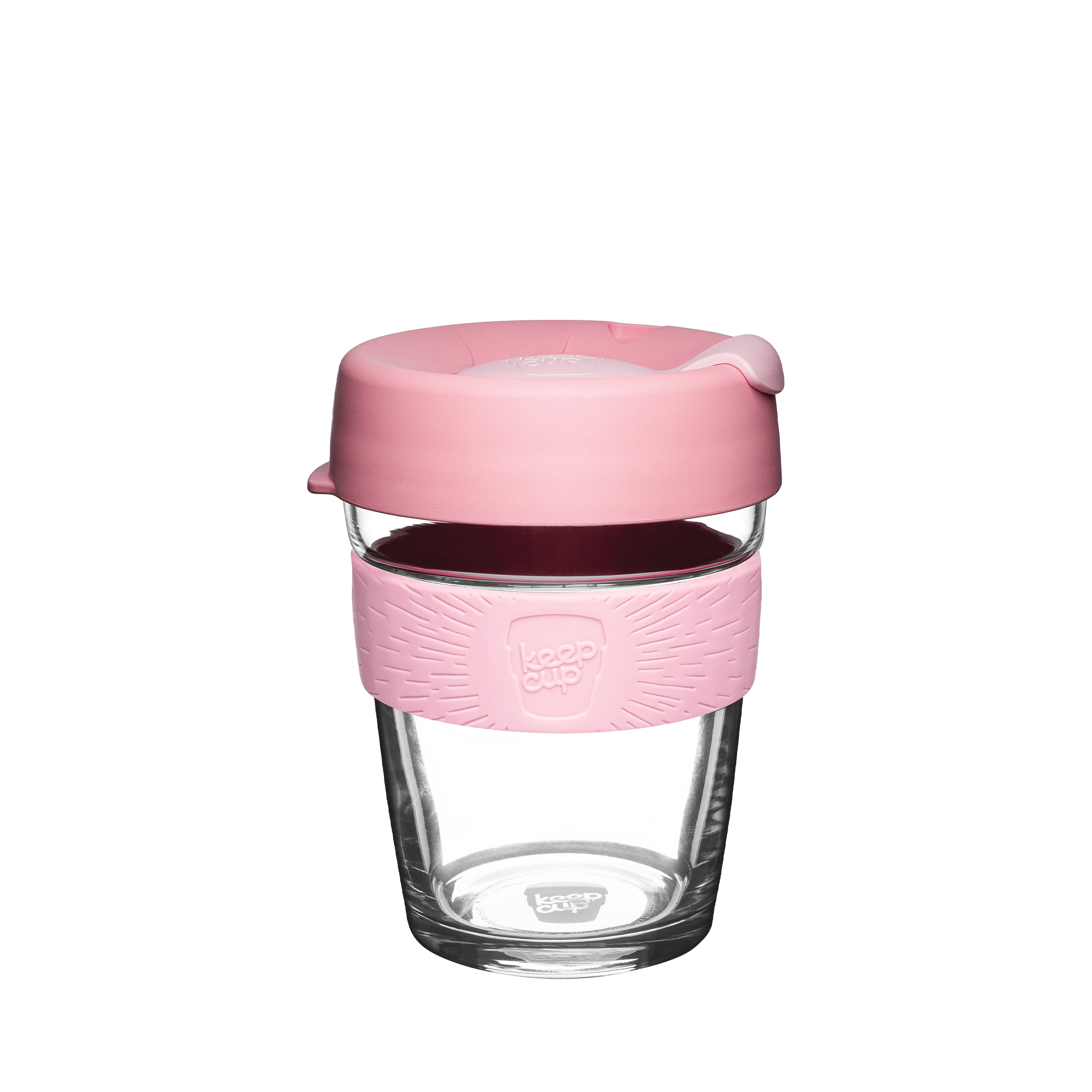 KeepCup glass reusable coffee cup with pink silicone sleeve and lid on a white background