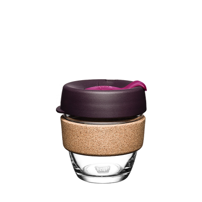 KeepCup Brew Cork S 8oz in Nutmeg, featuring a clear tempered glass cup with natural cork band, dark plum-coloured lid and bright pink plug, shown on a plain white background.