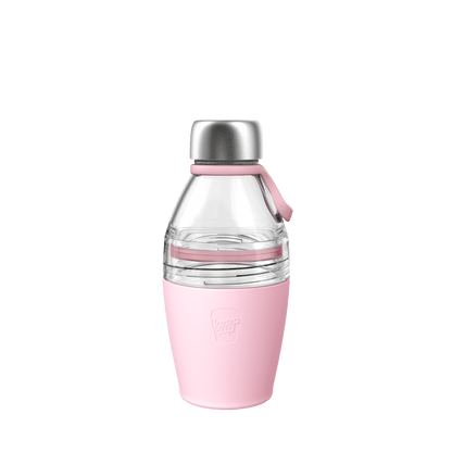 KeepCup Helix Bottle Clear Top 420ml in Pashmak Pink, featuring a clear glass top section, stainless steel cap with pink silicone carry loop, and soft pink silicone base with embossed KeepCup logo, shown on a plain white background.