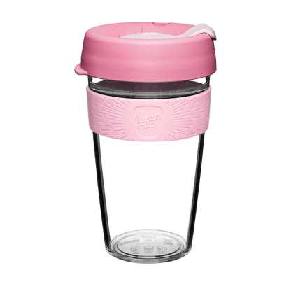 KeepCup Tritan plastic reusable coffee cup with pink silicone sleeve and lid on a white background