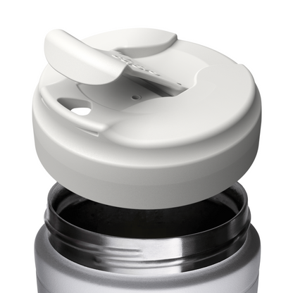 Close-up of a white KeepCup insulated travel mug with a flip-lid, shown partially removed from a silver cup base on a white background.
