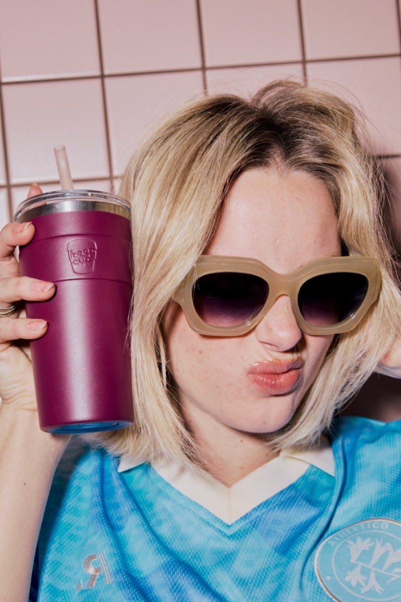 Woman holding KeepCup Sip & Chill Thermal travel Mug