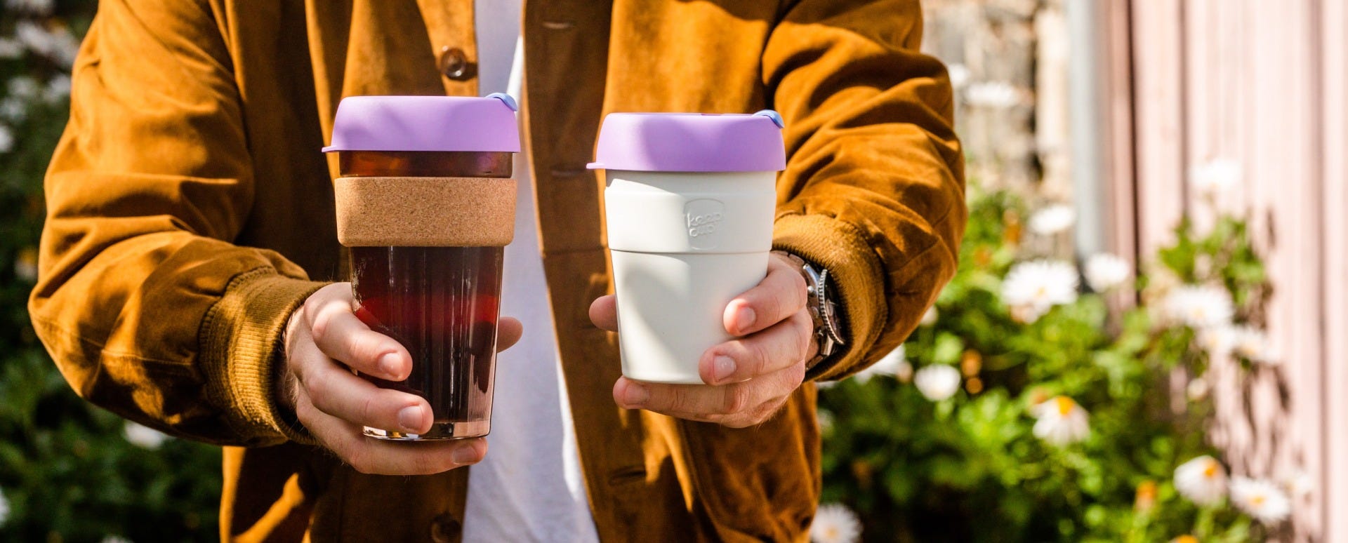 Man holding KeepCup Brew Cork 16oz with coffee