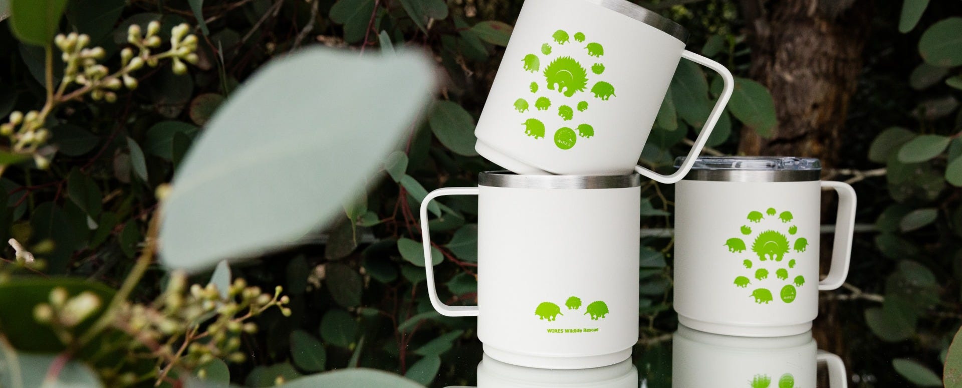 Three KeepCup WIRES Camp Mugs 12oz stacked with Eucalyptus